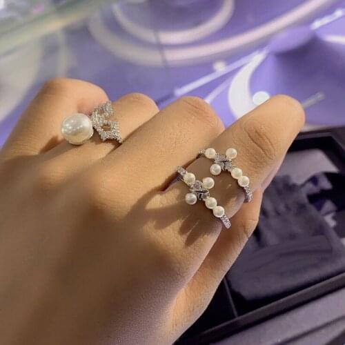 UMGODLY High Quality Fahsion Ring Silver Color Cross White Pearl Paved Cubic Zirconia Sliding Rings Women Jewelry