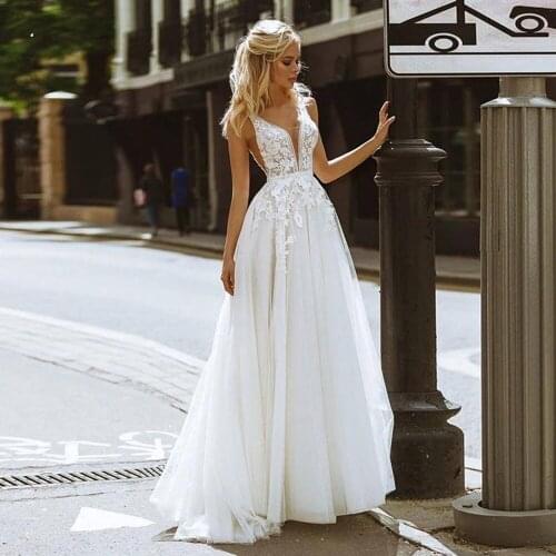 YIWUMENSA Deep V Neck Puffy Tulle A Line Wedding Dress Boho Lace Appliques Floor Length Backless Women Elegnt Bridal Party Gowns