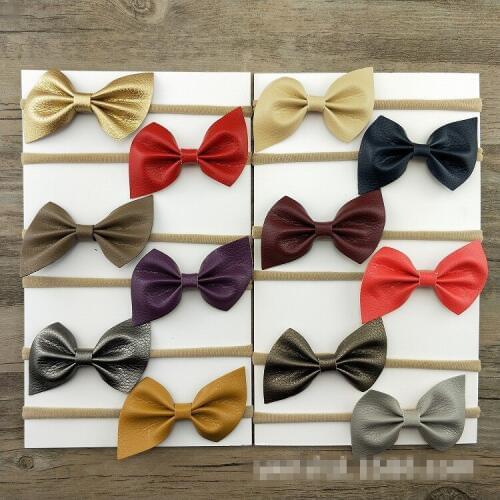 Boutique 60pcs Fashion Cute Leather Bowknot Newborn Headbands Solid Kawaii Bow Nylon Super Soft Hairbands Princess Headwear