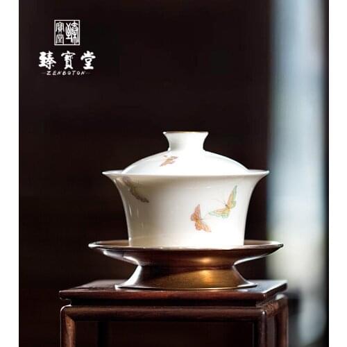 Zhenbaotang tea bowl covered with ceramic handmade tea bowl set with butterfly covered with copper cover and silver edge
