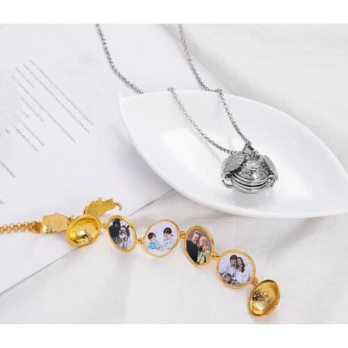 2019 Creative Magic Unisex Hollow Wings Expanding Memory Floating 4 Photo Locket Ball Pendant Album Box Necklace Lady Gift