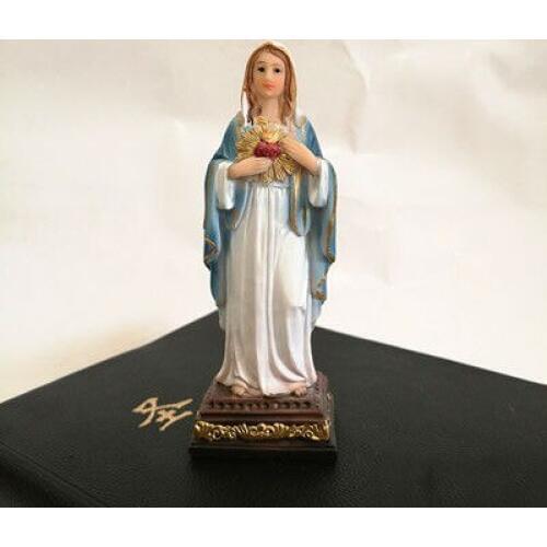 Sacred Heart of the Virgin, the Virgin Mary, the statue of the Mother of God, the Catholic Relic