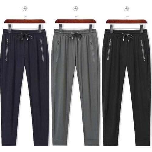 2021 Factory New Spring Autumn Sports Outerwear Athletic Running Quick Dry Breathable Fitted Leisure Pants Casual Trousers L-8XL