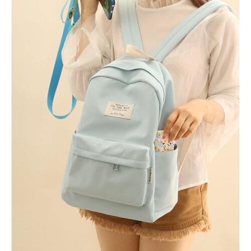 Pure color small pure and fresh and han edition contracted high school bag men and women backpack waterproof backpack