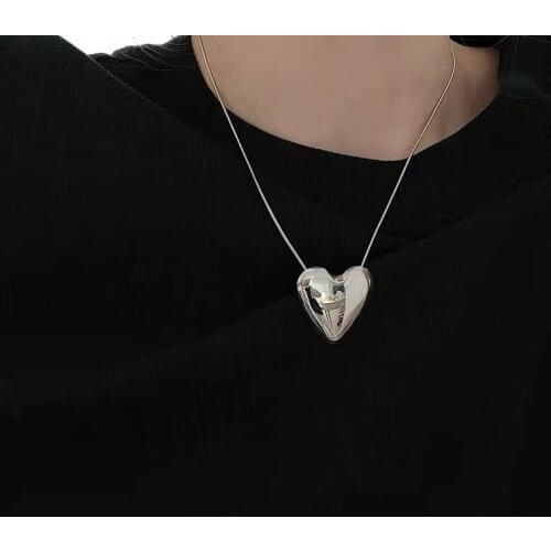 KARASU Silver Pendants