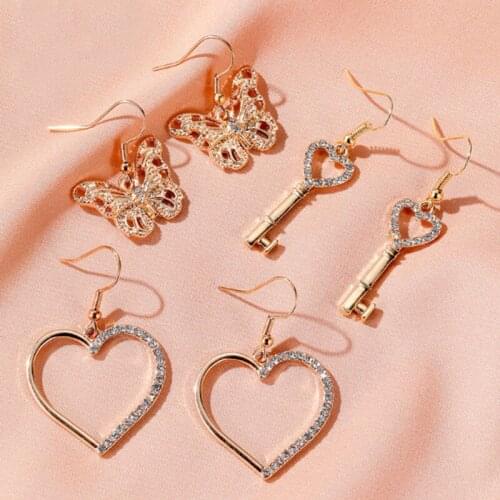 Metal hollow butterfly pendant female earrings creative love key diamond pendant earrings woman fashion party jewelry