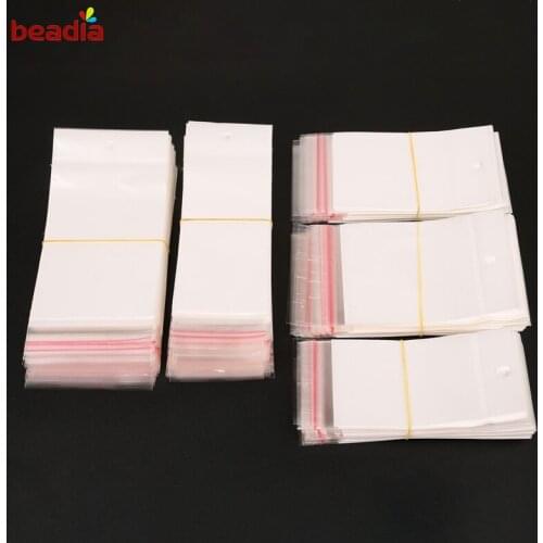 Self-Adhesive Plastic Storage Bag 100pcs Three layers Contain Holes Small Baggies Gift Candies Packing Bags Transparent Clear