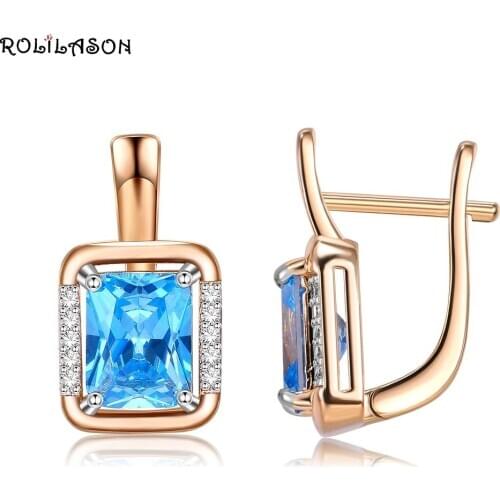 ROLILASON Trendy Blue Crystal Inlaid Rhinestone Flower Golden stud Earrings For Women Wedding Party Jewelry JE1222
