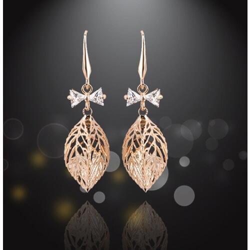 New Fashion long Hollow out the leaves Rose Gold earrings white crystal drop earrings High quality Women Wedding earrings E1345