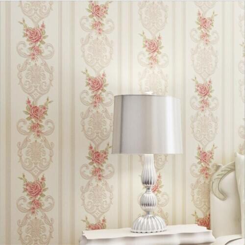 Beibehang Continental pastoral pink flowers non-woven striped wallpaper warm living room bedroom shop background wall paper