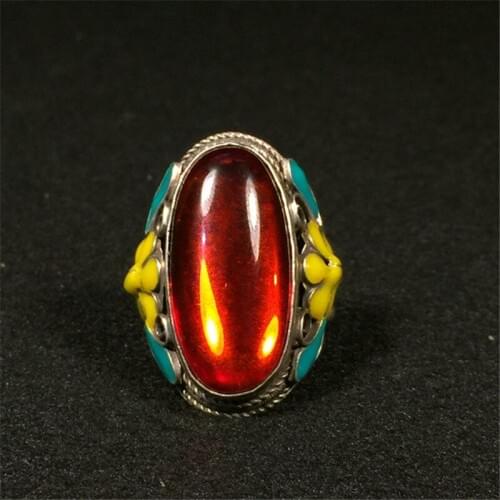 Collection of jewelry with rubies and silver rings