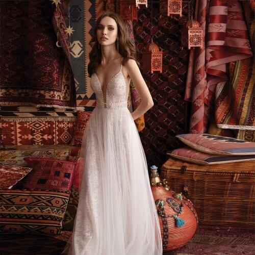 Bohemian Wedding Dresses Beaded Spaghetti Straps Lace Light Tulle Beach Bridal Gowns Sexy Backless Bride Dress Boho 2021