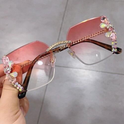 2021 new gradient sunshade mirror European and American trend glasses edging studded rimless metal ladies sunglasses