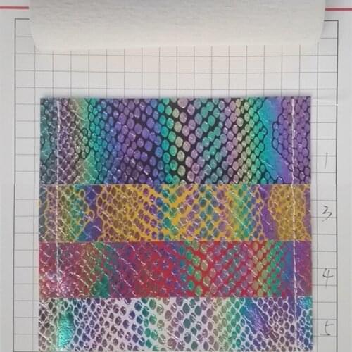 PVC laser magic snake artificial leather seven color rainbow snake bag holographic leather wholesale