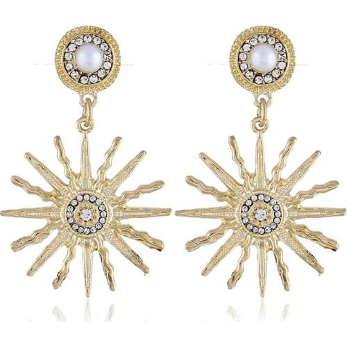 New European and American fashion personality alloy sun flower earrings Imitation pearl metal earrings jewelry