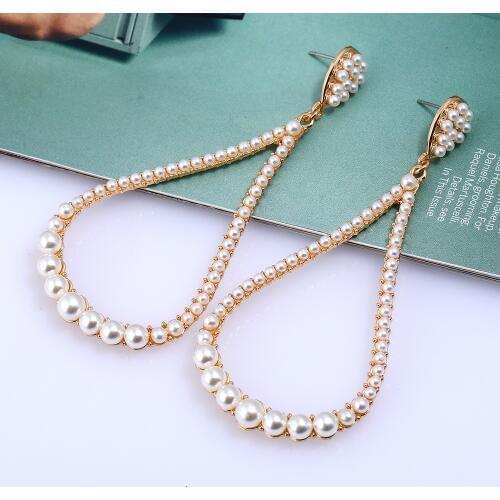 The New Creative pearl Fashion earrings for women Bohemia Long section Alloy inlaid pearl Personality earrings