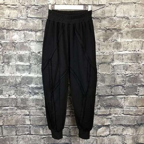 Autumn and winter original design mens black slim feet pants personality stitching loose radish pants beam pants tide