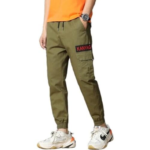 Mens Casual Pants New Solid Color Elastic Waist Loose Fashion Cargo Pants Jogging Fitness Pants Sport Trousers
