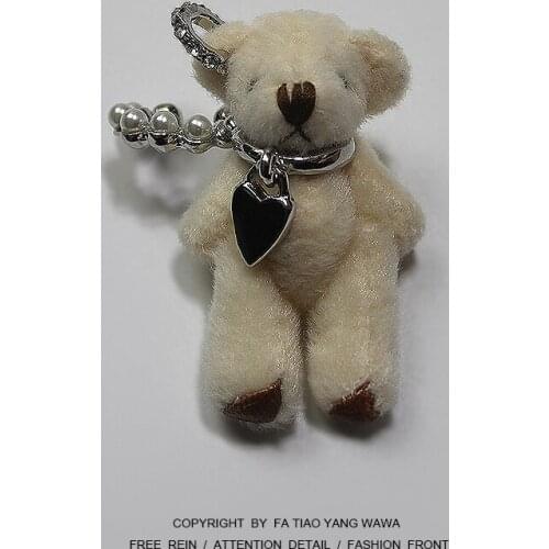 Bear heart pearl ear clip