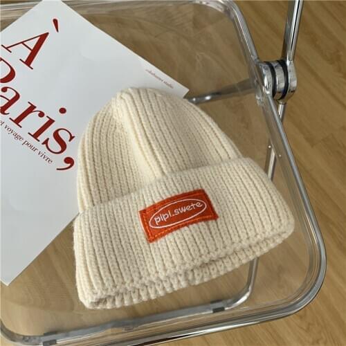 Han edition knitting wool hat qiu dong ins couples make firm offers mens and womens street bump color embroidery warm hat