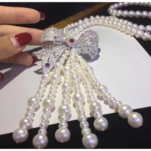 Exaggerated blue red zircon large bow hollow pendant long natural pearl necklace female high jewelry necklace birthday gift