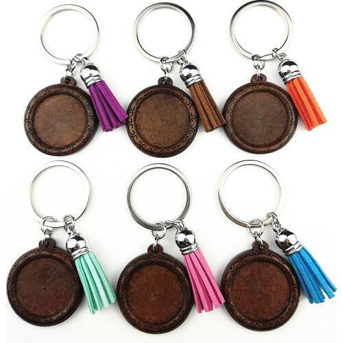 Jiangzimei 2019 New style 24pcs Wood Cabochon Stainless Steel Keychain 25mm Blank Wooden pendant with tassels Keyring Wholesale
