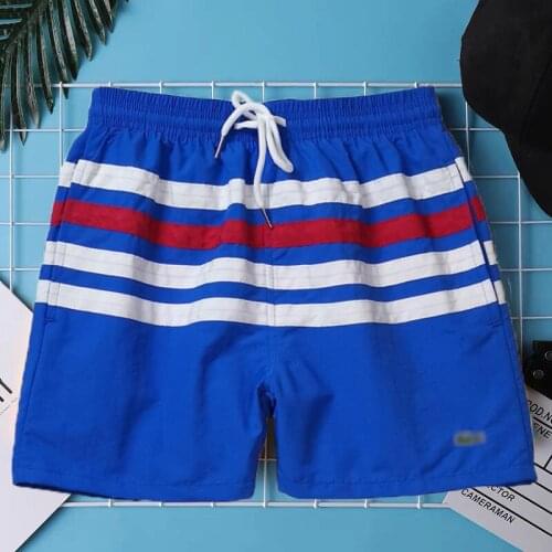 Mens Summer Fashion Pants Solid Color Loose Sports Drawstring Pocket Shorts Casual Beach For Man New Style Hot Sale