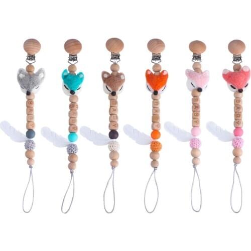 New Baby Wood Pacifier Clip Cartoon Animal Teething Chain Silicone Feather Teether