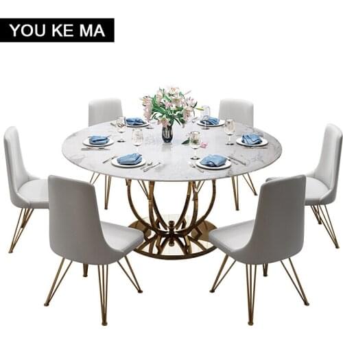 Marble round dining tables and chairs set6People Light luxury steel dining table Restaurant post-modern home with turntable
