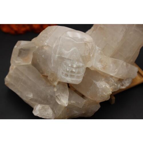 Very large specimens of natural quartz crystal carved skull healing magic wand