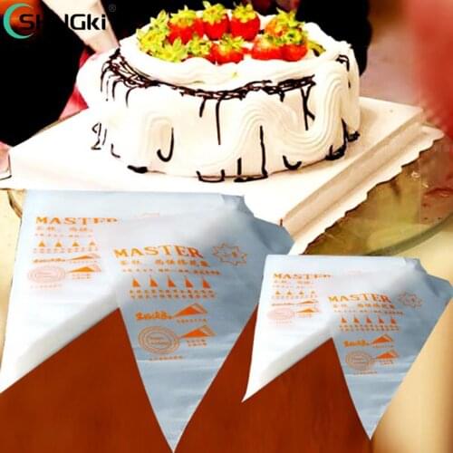 100Pcs/bag Icing Nozzle Fondant Cream Pastry Tips Wedding Cake Decorating Tools Disposable Plastic Pastry Piping Bag 17 * 27 Cm