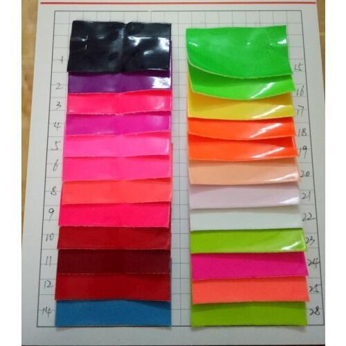 Fluorescent Mirror surface leather quality PU leather fabric smooth fluorescent synthetic leather material