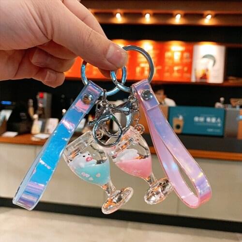 Cartoon key chain acrylic drifting bottle milk pig quicksand creative key chain ring liquid oil bag pendant Decoration