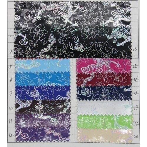 Wholesale high end fashion mirror laser dragon artificial PU leather fabric glossy leather fabric material wholesale decoration