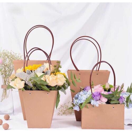 Waterproof portable flower packaging paper bag plant gift bag boite dragees de mariage коробка упаковка пакетики для конфет 10pc