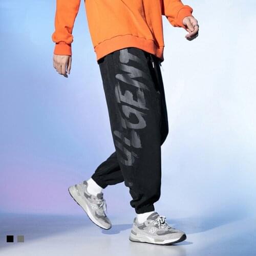 Mens Street Fashion Overalls Mens Japanese Sports Casual Pants Mens Trendy Brand Printed Bouquet Foot Guard Pants Mens Pants