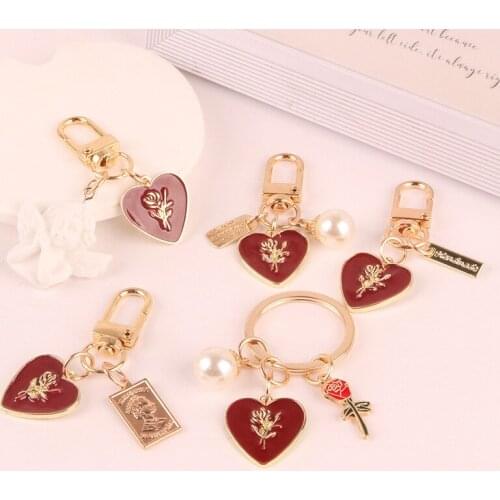 Fashion Baroque Imitation Pearl Chain Rose Keychains Red Heart Tag Angel Sculpture Alloy Keychain Bag Pendant Keyring Gifts