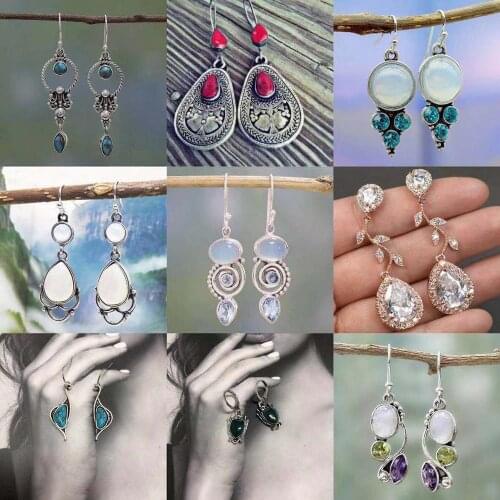 Wish hot sales inlaid sea blue stone earrings European and American female creative rotating drop pear-shaped pendant