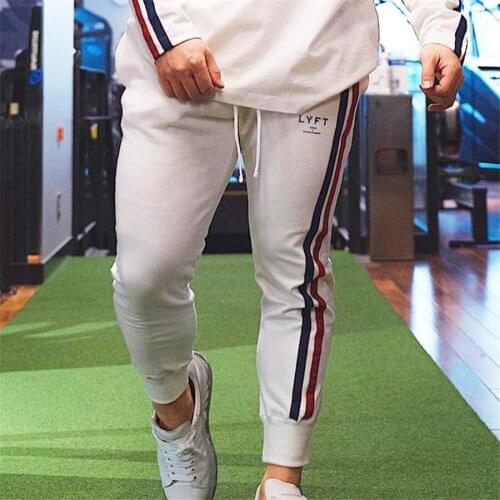 Men muscle fitness running training sports cotton trousers mens breathable Slim beam mouth casual health pants Male