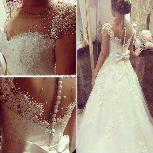 Modest Pearls Wedding Gowns Lace Bride Dresses 2017 Cap Sleeve Vestidos de Casamento Princess Wedding Dress V Neck Bow Applique