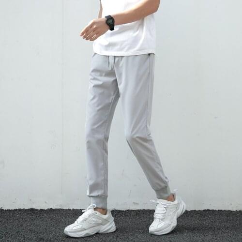 Mens Solid Color Thin Casual Pants Fitness Breathable Quick Dry Full Length Male Trousers Man Plus Size 5XL Pants Spring Autumn
