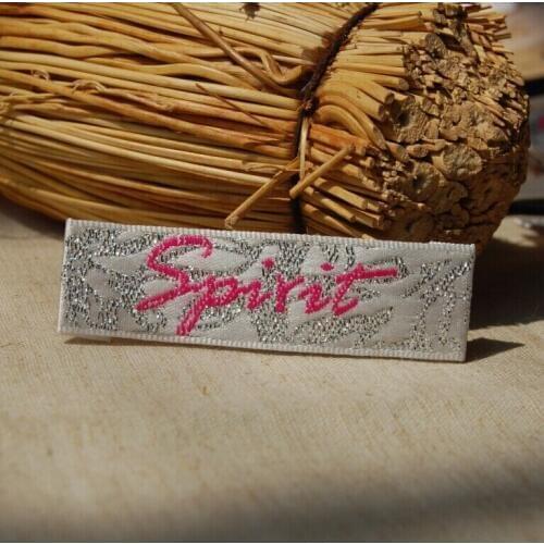 Custom clothing satin woven labels/overcoat feather dress embroidered tags/garment printed labels