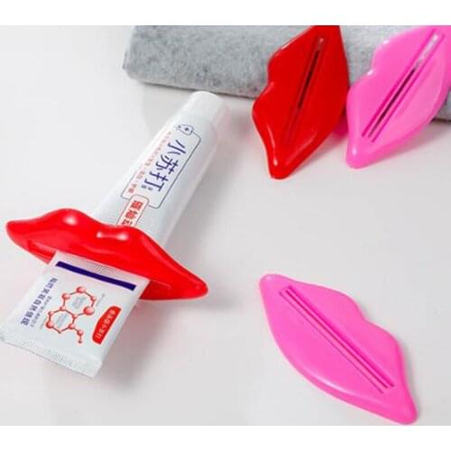 Hot Sale Easy Toothpaste Dispenser Lip Shape Plastic Tooth Paste Tube Squeezer Useful Toothpaste Rolling Holder For Home