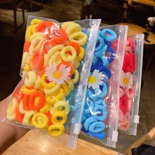 WYINYA 100 pieces of candy-colored childrens rubber bands to tie the hair without hurting the hair towel hair ring mixed color
