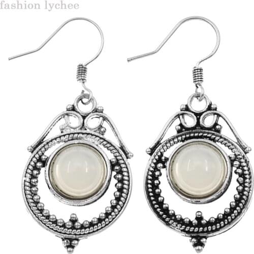 Fashion lychee Retro Moon Stone Earrings Handmade Womens Dangle Earrings High Quality Hollow Metal Banquet Ear Jewelry