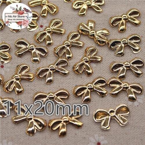 100pcs 11x20mm plastic golden bowknot resin flatback cabochon DIY jewelry/phone Charm decoration