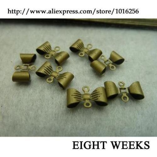 Zinc alloy pendant jewelry accessories diy handmade material charms Bowknot is 7 * 12 mm