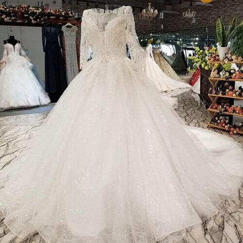 Serene Hill 2019 Lastest Gorgeous Long Sleeves Wedding Dress with Long Train O-Neck Beadings Sequins Organza Bridal Wedding Gown