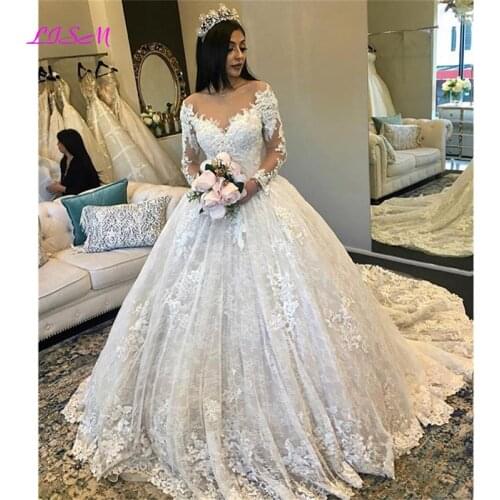 Puffy Wedding Dresses 2020 Sheer Neck Long Sleeves Ball Gown Court Train Beaded Lace Bride Dress Princess Wedding Dress