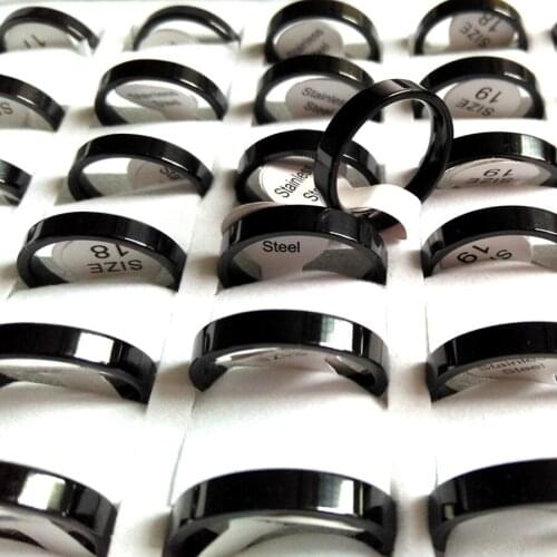 Bulk lots 100pcs Good Quality No fade 4MM Black Stainless Steel Band Rings Sizes for Men and Women Man Accessories Boy Gift